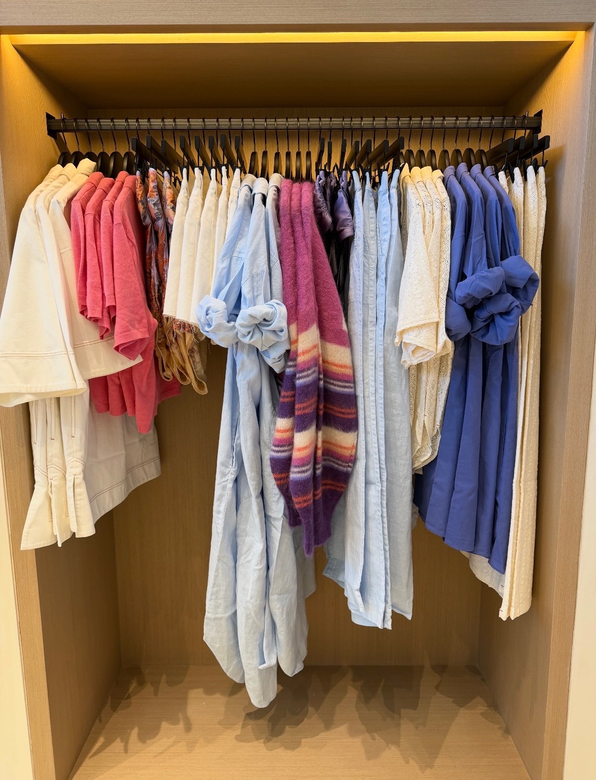 Completed Malibu apparel display organized in white, pink, blue, and purple color stories